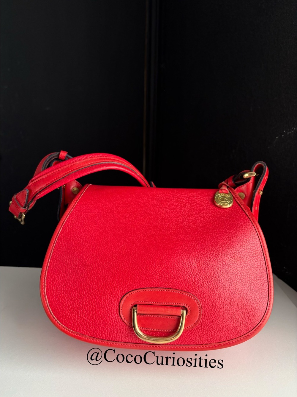 Dooney and Bourke awl Leather Horseshoe Saddle Bag